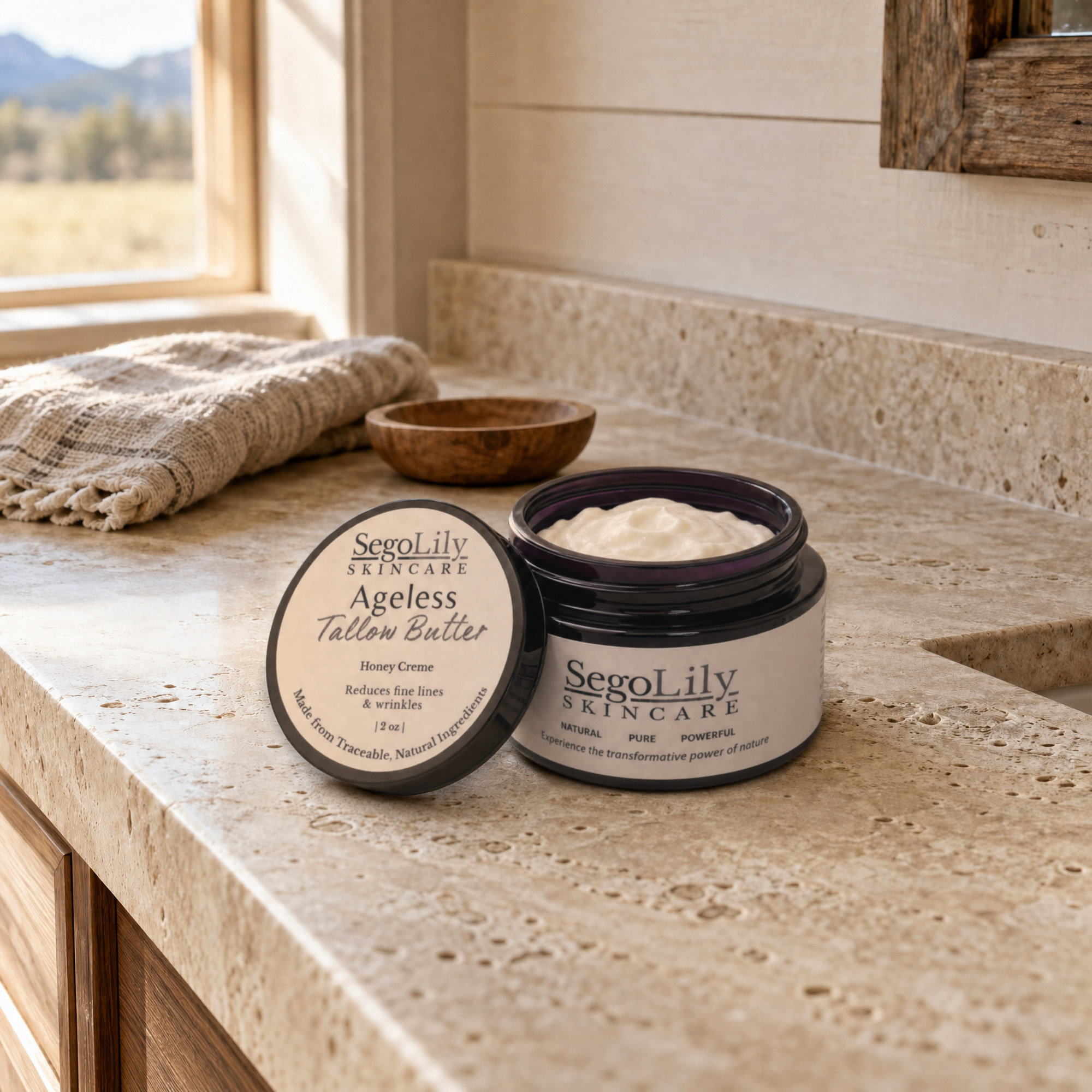 Ageless Tallow Butter on a stone bathroom vanity in morning light